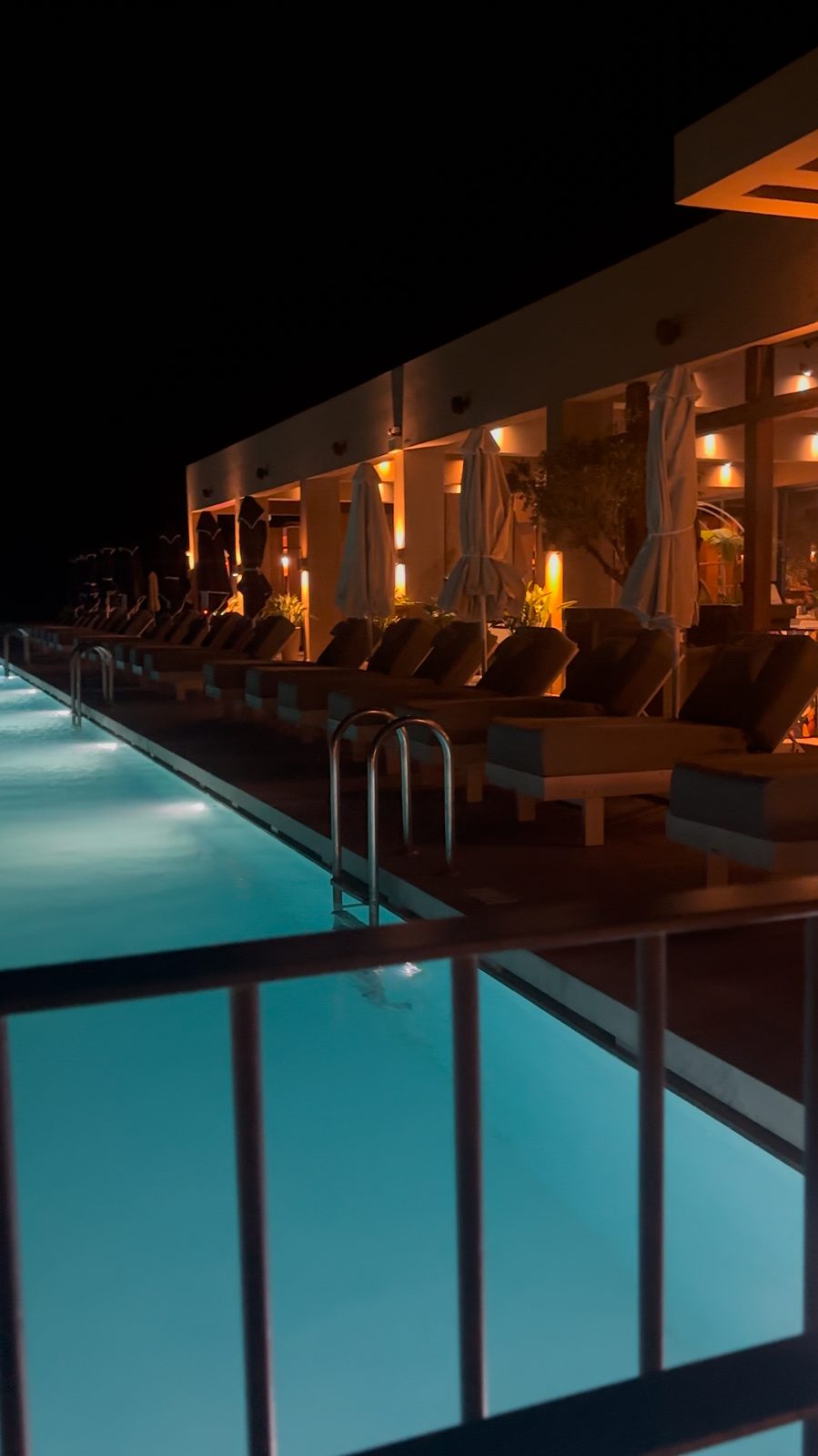 The rooftop pools at Greco Levante after dark, at the adults only all inclusive Domes Aulus Elounda Crete